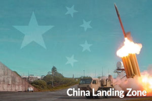 Flag of China laid out over a launch of a large projectile.