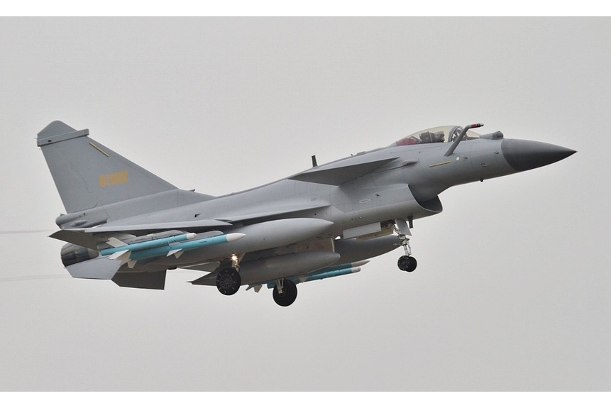 Stein 02 A J 10B carrying PL 10 and PL 12 air to air missiles landing at Zhuhai Jinwan airport